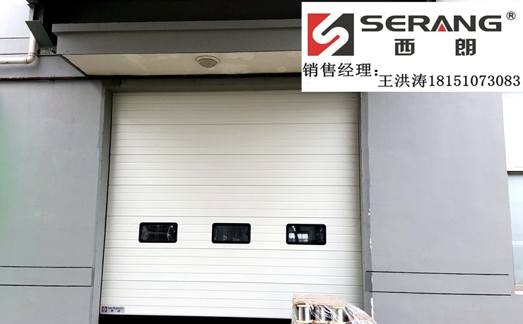 门业图片-工业提升门常州工厂滑轨提升门订做gbn14图片